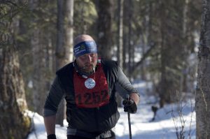 A competitor in the Oosik's 50km race makes his way through the Talkeetna woods. Photo: Phillip Manning