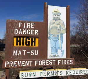 The fire danger level sign near the "Y."  Photo by Katie Writer - KTNA