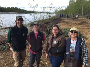(L to R) Franklin Dekker, a hydrologist for US Fish and Wildlife Service, Catherine Inman with Mat-Su Conservation Services, Tracy Smith with the Alaska Department of Fish and Game, property owner Geri McCain. Photo by Katie Writer - KTNA