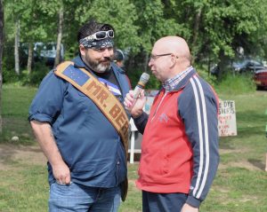RJ Johnson (L) speaks to Daphne Doall LaChores (R) about coming home to Talkeetna for Pride.