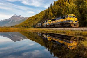 This is the grand prize photograph from last year’s Catch the Train Photo Contest. Pictured is the Coastal Classic chugging along the Turnagain Arm. Photo Credit: Michael Sullivan.