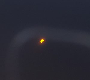 Partial eclipse as viewed from Talkeetna. Photo: Phillip Manning - KTNA
