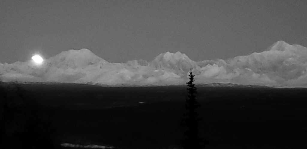 oon setting on the western flank of Foraker Wednesday 12-11, 9:05 AM (6 hours before the moment of FULL).  Credit:  Diane Okonek.