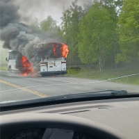 Tour bus on fire on Parks Highway
