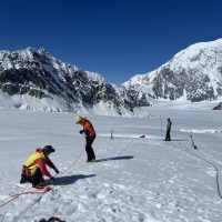 Patrol #7 warming up with some crevasse rescue skills outside of Basecamp.
