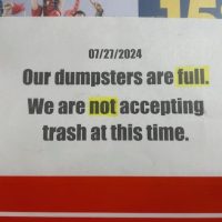 Notice of full trash containers at the Trapper Creek Transfer Station, July 2024