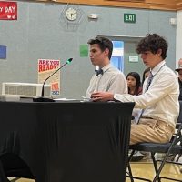 Miles Osmond, Su-Valley High School President and Liam Kaso, Su-Valley High School Vice President present to the Mat-Su School Board on September 18, 2024. Photo: Colleen Love