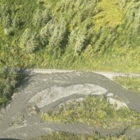 Aerial view of a washed out section of Petersville Road near Cache Creek. Photo credit: David Essex