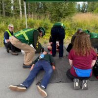 Community members participating in a simulation exercise at the Community Emergency Response Team (CERT) training.